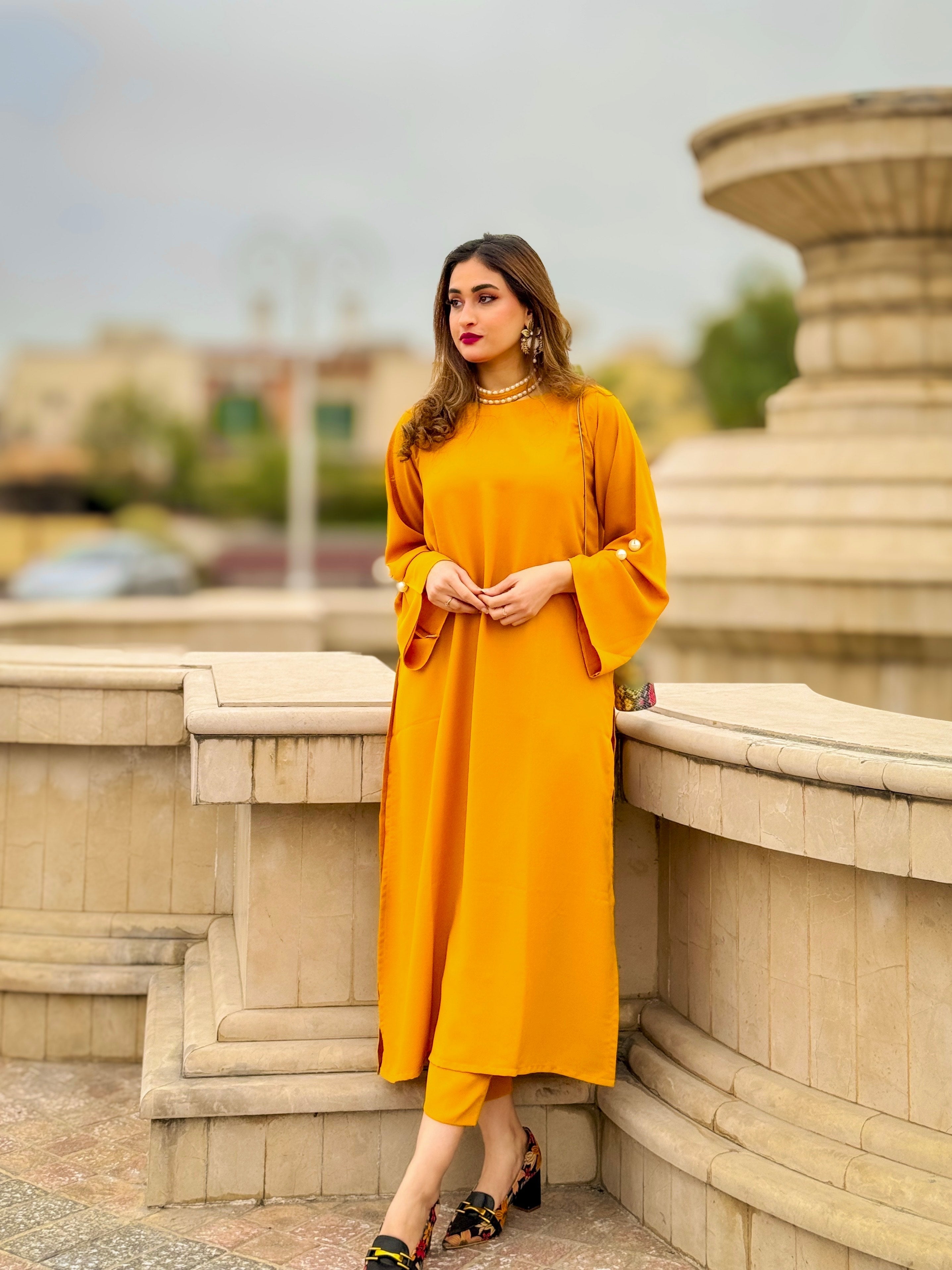 Manahils Stitched Mustard Pearls